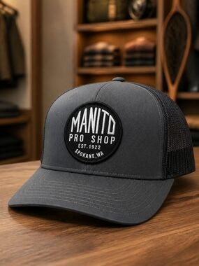 The Classic Charcoal Gray MANITO Pro Shop Patch Trucker Hat